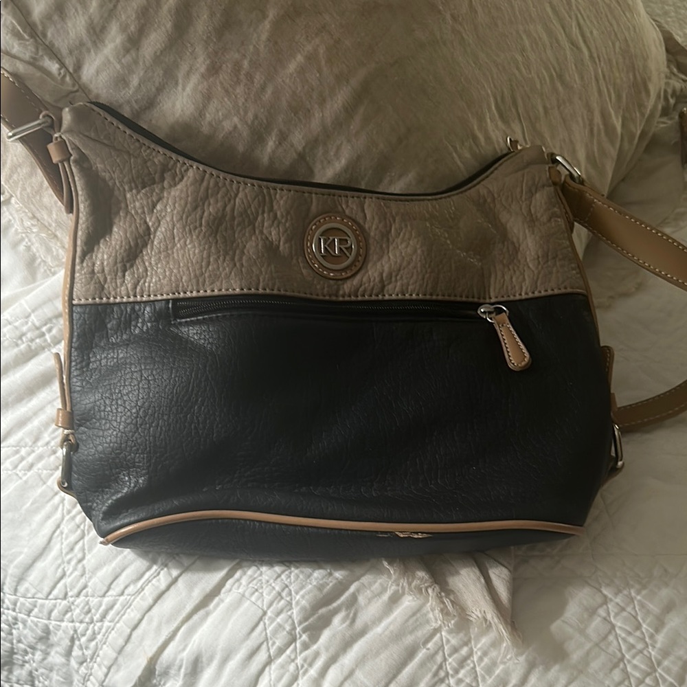 Kim Rogers Black and Tan Crossbody Bag with Structured Design